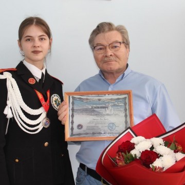 Ю. Дворяшина – победитель Всероссийской научной конференции со сказителем В.Е. Еновым